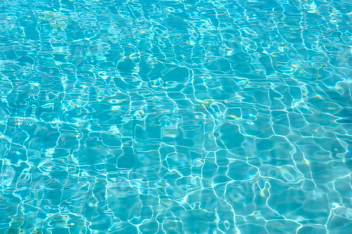 Preview: Blue Sea Flowing Water Surface With Waves And Sun Glitters. Abstract Background Pattern.