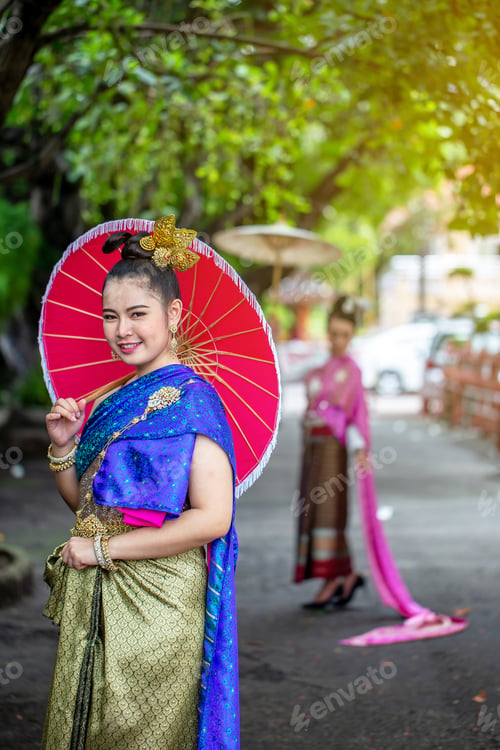 Preview: Pretty Thai Women In The Northern Thailand Traditional Dress With Colourful Robe And Nice Hair Pin