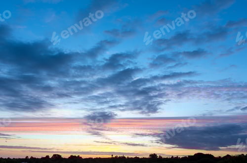 Preview: Sunset With Clouds Illuminated By Evening Sun. Nature Background.