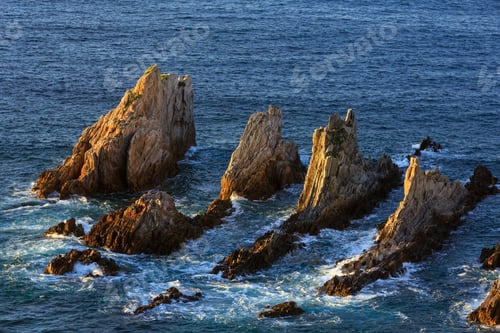 Preview: Sharp Islets Near Gueirua Beach (Asturias, Spain). Evening Atlantic Ocean Landscape.