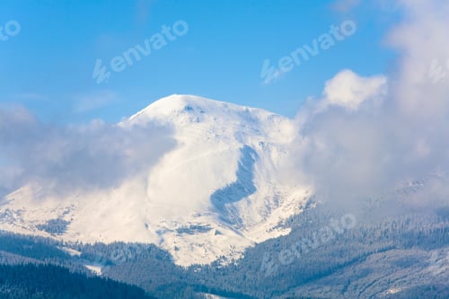Preview: Morning Cloudy Winter Mountain Landscape. Goverla Mount View, Carpathian, Ukraine.