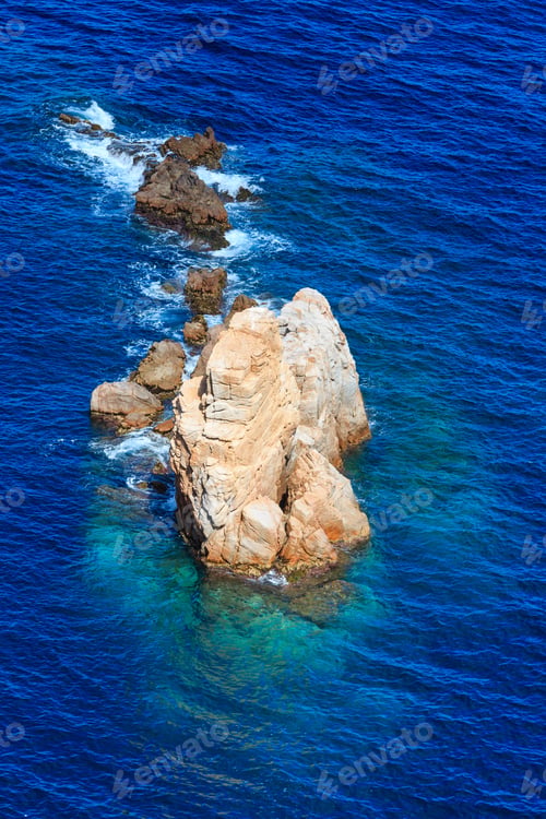 Preview: Rock In Clear Sea Water Near Shore. View From Above.