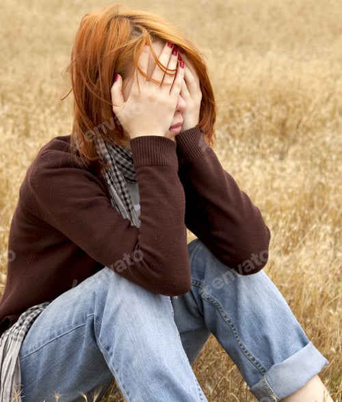 Preview: Lonely Sad Red-Haired Girl At Field