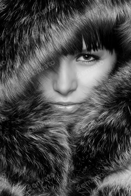 Preview: Smiling Young Woman With A Fur Hood