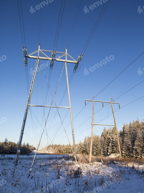 Preview: Electricity Power Lines On A Winter Morning. Sun Is Shining Low. Electricity Consumption Is High At