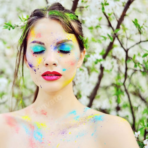 Preview: Beautiful Woman With Colored Paint On Face Outdoor
