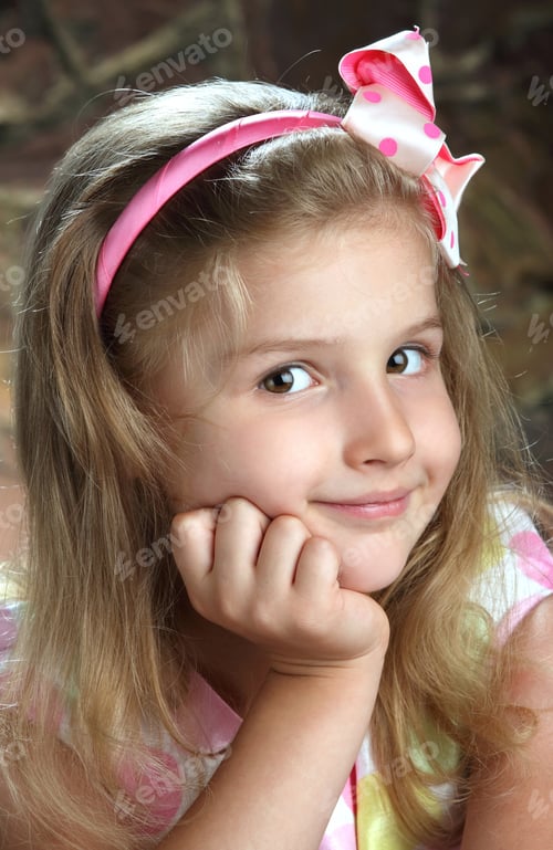 Preview: Beautiful Little Girl With A Pink Bow On Her Head