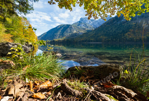 Preview: Sunny Idyllic Colorful Autumn Alpine View. Peaceful Mountain Lake With Clear Transparent Water And