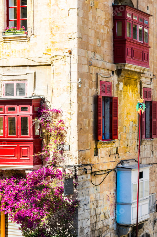 Preview: Building With Traditional Colorful Maltese Balcony In Historical Part Of Valletta. Red Windows