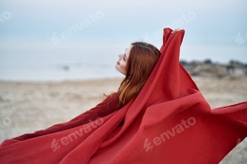 Preview: Woman At The Sea With A Developing Red Plaid, Nature, Vacation