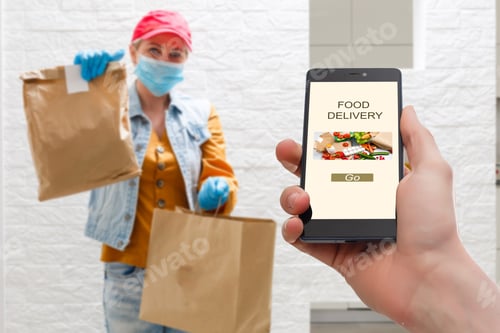 Preview: Delivery Food Service At Home. Man Courier Delivered The Order No Name Bag With Food. Hand Holding