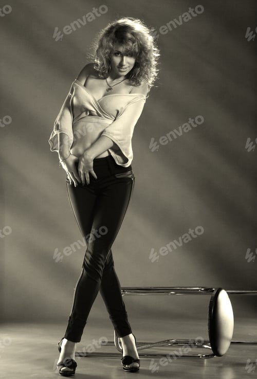 Preview: Red-Haired Girl In An Artistic Composition With Bar Stool