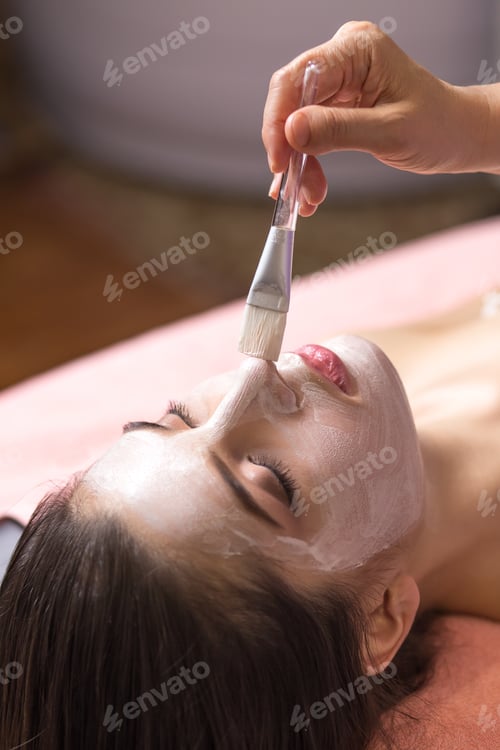 Preview: Spa Concept. Young Woman With Nutrient Facial Mask In Beauty Salon, Close Up