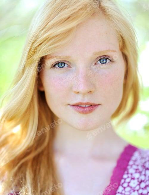 Preview: Close-up Portrait of Blond Woman with Blue Eyes