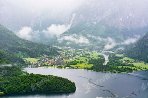 Preview: Rain And Clouds On The Obertraun In Austria. Morning Mist Over The Austrian Landscape With Lake