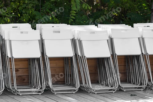 Preview: The Folding Chair With The Metal Case And A Plastic Seat Mat And A Back Costs On A Wooden Floor