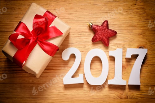 Preview: Present Box With Sign 2017 On Wooden Background In Vintage Style - Merry Christmas And Happy New