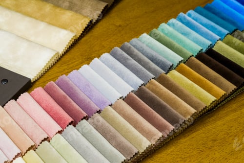 Preview: Colorful Fabric Swatches on a Wooden Table