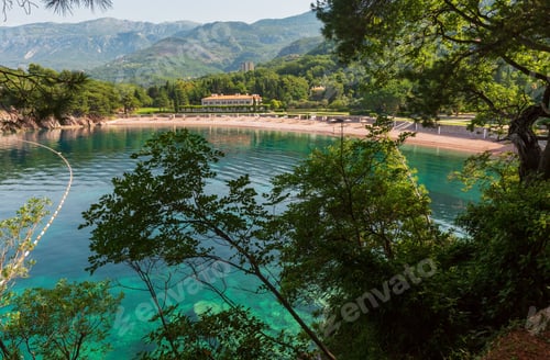 Preview: Pink Sandy Milocher Beach Through Branches Of Trees (Montenegro, Budva)