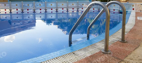 Preview: Pool Side. Swimming Pool Water Reflections, Ladder On The Edge. Image Suitable For Banner And Cover