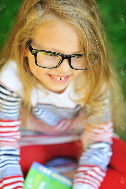 Preview: Closeup Of Cute Little Girl In Glasses - Outdoor