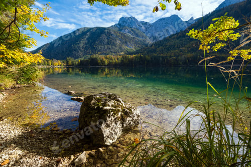 Preview: Sunny Idyllic Colorful Autumn Alpine View. Peaceful Mountain Lake With Clear Transparent Water And