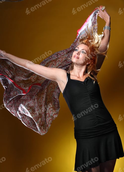 Preview: Elegant Woman Posing with Flowing Colorful Scarf
