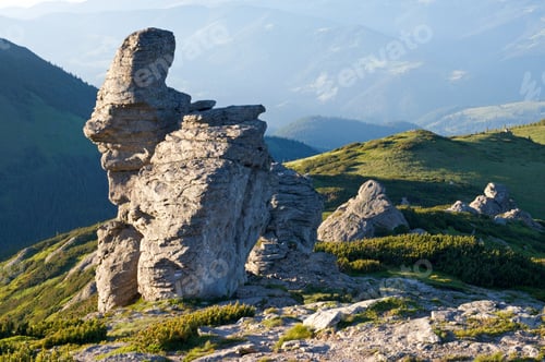 Preview: Big Stony Figure In Human Face Form On Mountain Ridge