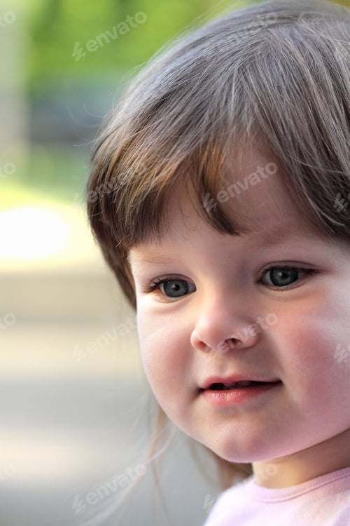 Preview: Portrait Of Little Girl On Green Grass . Children'S Emotions