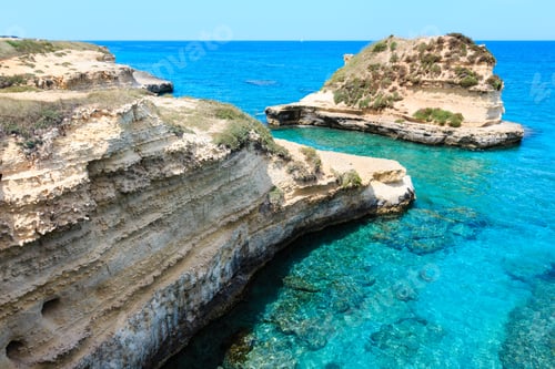 Preview: Picturesque Seascape With White Rocky Cliffs, Sea Bay And Islets At Grotta Dello Mbruficu, Salento