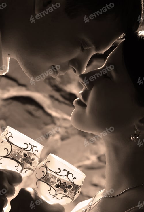 Preview: Portrait Of The Newlyweds On Studio Shooting With Glasses Of Champagne
