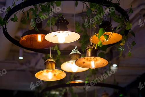 Preview: Several Round Pendant Retro Loft Style Lanterns With Edison Bulbs Shine With Warm Light In Interior