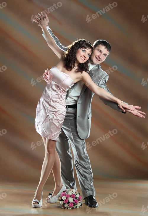 Preview: Happy Couple At The Wedding On Brown Background
