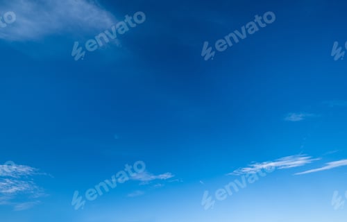 Preview: White Fluffy Cirrus And Cirrocumulus Clouds In Deep Blue Azure Sky. Summer Good Weather Concept