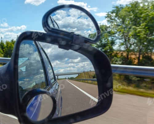 Preview: Reflection Of Sky With Clouds In The Side Mirror A Car.