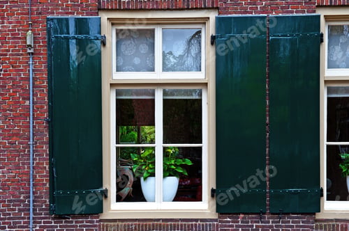Preview: Window With Green Shutters In The Dutch City