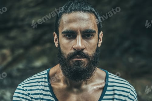 Preview: Portrait Of A Brutal Bearded Man Looking At Camera