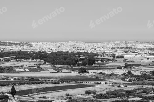 Preview: Rural Landscape With Asphalt Roads And Fields On Malta. Maltese City On The Background Of