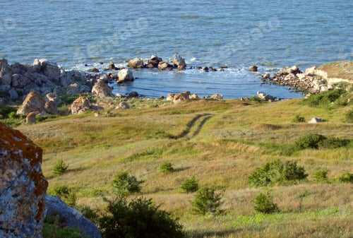Preview: Small Sea Bay With Rocky Borders And Birds On Stones.
