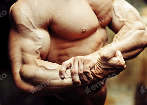 Preview: Close Up On A Bodybuilder Biceps. Strong Arm And Chest