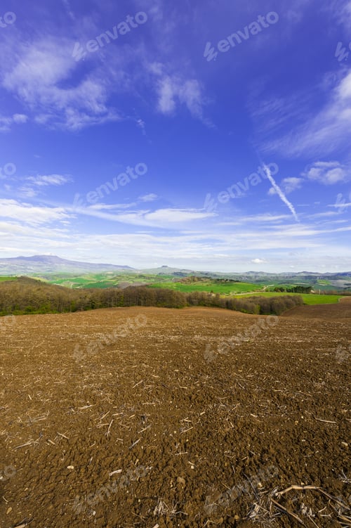 Preview: Plowed Sloping Hills Of Tuscany In The Spring. Rural Landscape With Field Ready For Sowing