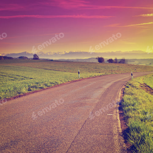 Preview: Asphalt Road On The Background Of Snow-Capped Alps, Sunset In Switzerland, Instagram Effect