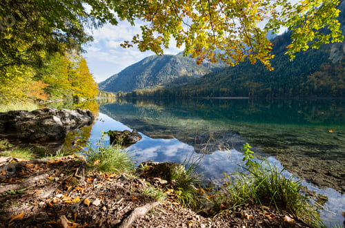 Preview: Sunny Idyllic Colorful Autumn Alpine View. Peaceful Mountain Lake With Clear Transparent Water And