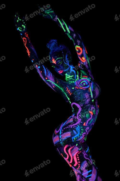 Preview: Art Woman Body Art On The Body Dancing In Ultraviolet Light. Bright Abstract Drawings On The Girl