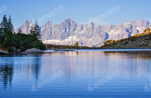 Preview: Sunny Autumn Alpine View. Peaceful Mountain Forest Lake With Clear Transparent Water And
