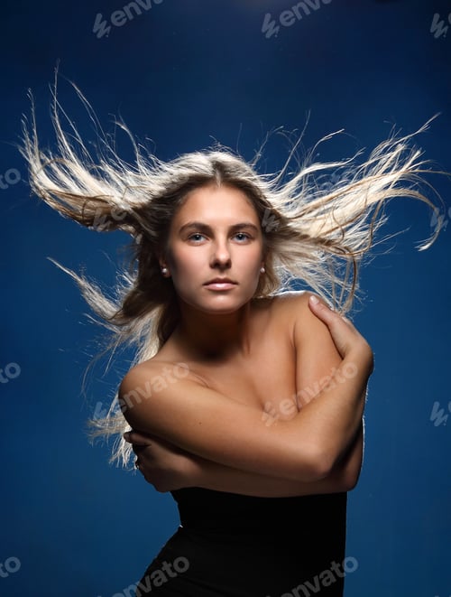 Preview: Red-Haired, Blue-Eyed Girl In An Emotional Flight With The Wind From The Developing Hair