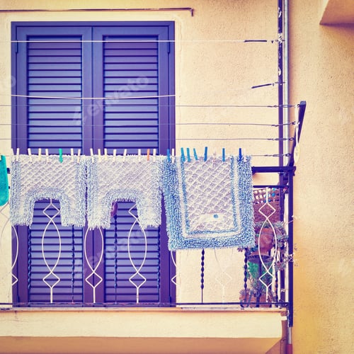 Preview: Italian Balcony In Palermo With Closed Wooden Shutters, Decorated With Mats, Instagram Effect