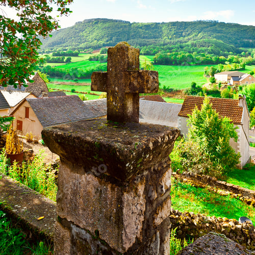 Preview: Stone Cross On The Background Of The French Town