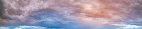 Preview: Fluffy Clouds In Evening Overcast Sky Panoramic View. Climate, Environment And Weather Concept Sky