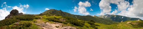 Preview: Summer Mountain View With Snow And Big Stones On Mountainside. Five Shots Stitch Image.